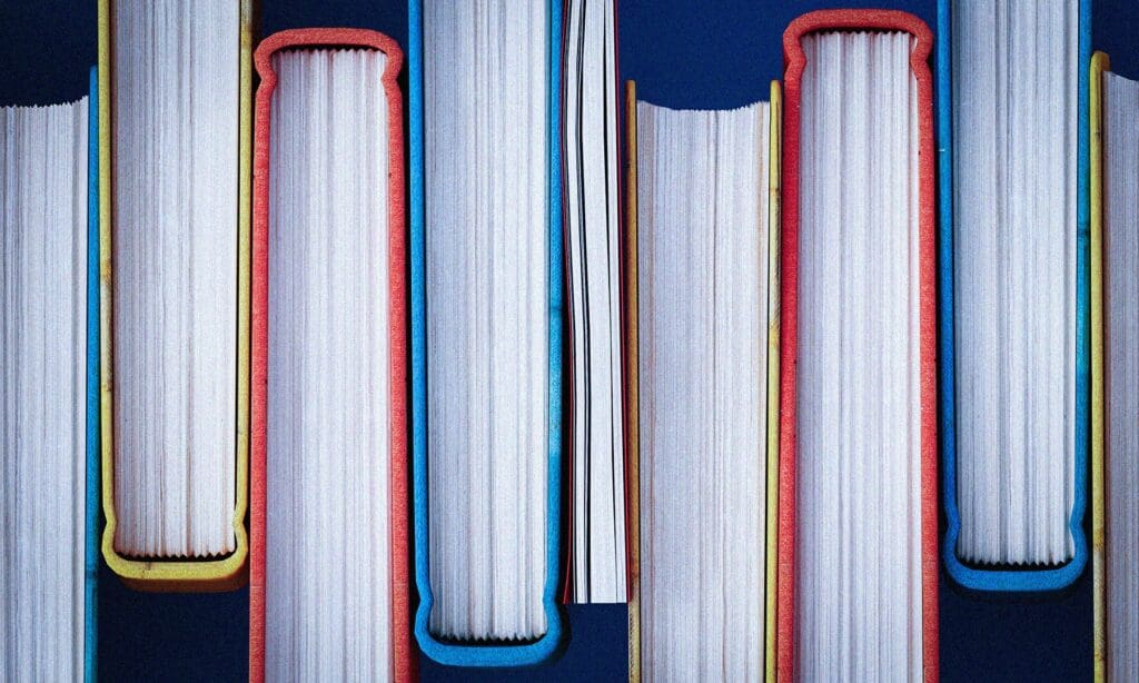 Top view of 8 books lined together