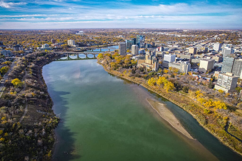Aerial view of the Central Business District which is Saskatoons bustling neighbourhood of downtown living and business development. If you love the thriving energy of your neighbourhood streets lined with coffee shops, restaurants, shopping, gorgeous Meewasin, river, trails and nightlife then this community is for you.