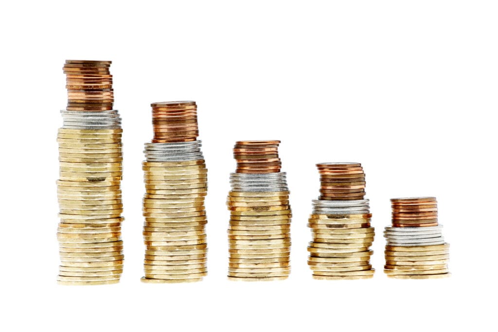 Canadian coins in columns with white background