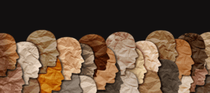 Profile paper silhouettes of people in different skin tones