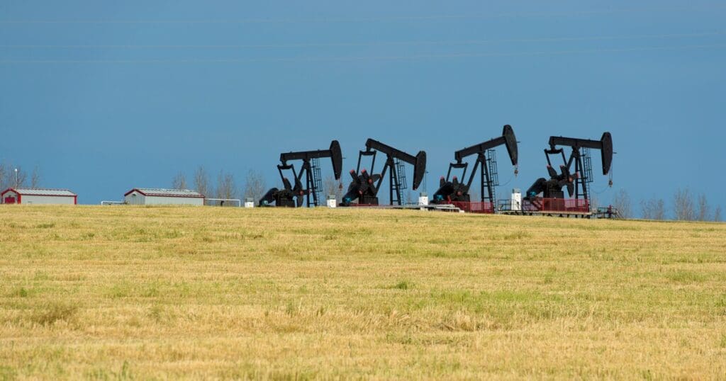 Photo of well sites in the Montney region of BC. Photo copyright Garth Lenz.