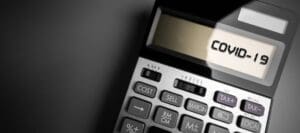 A calculator displaying the text "COVID 19."