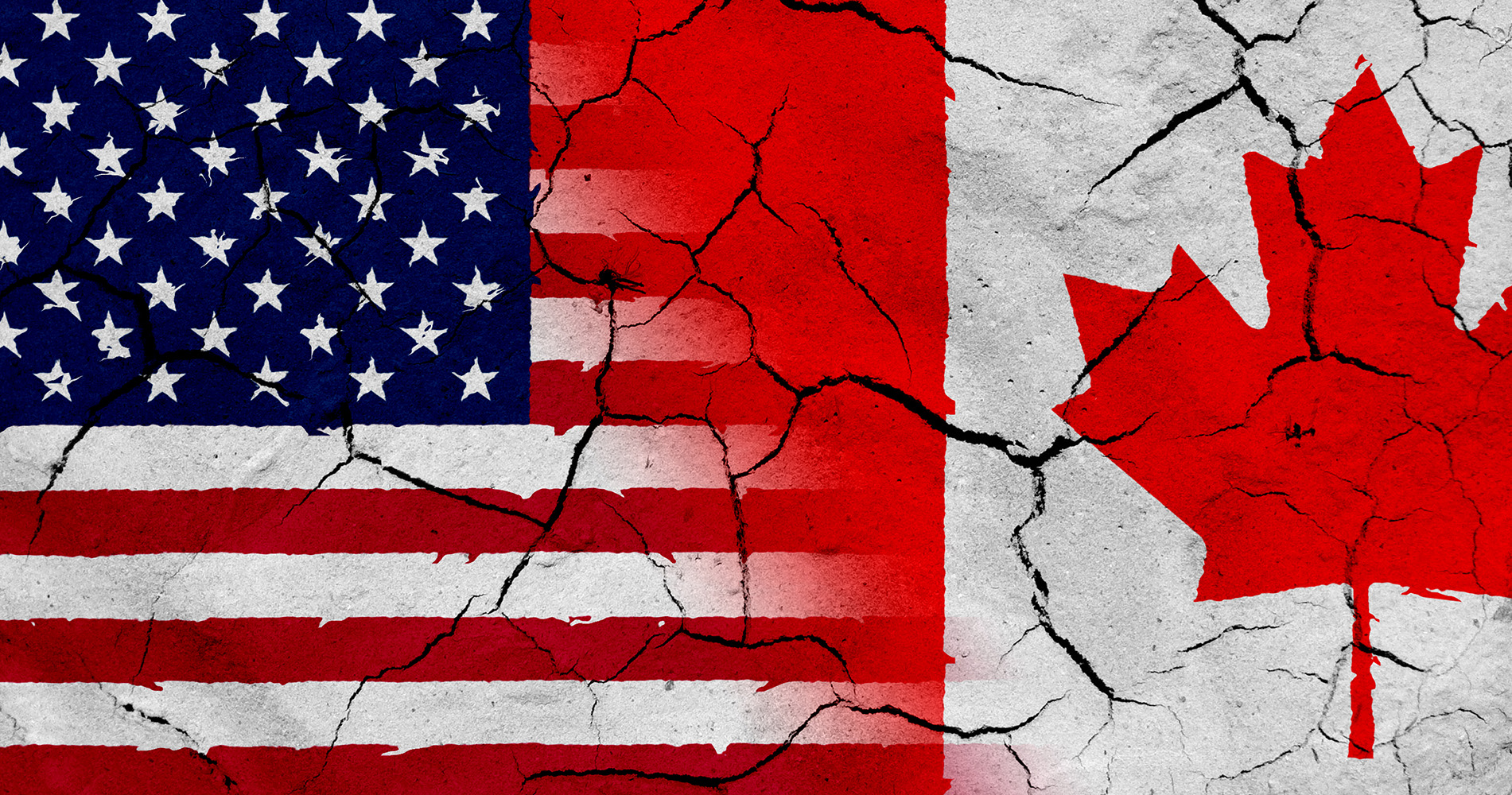 half of an American flag next to half of a Canadian flag