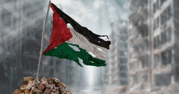 The Palestinian flag ripped up in rubble