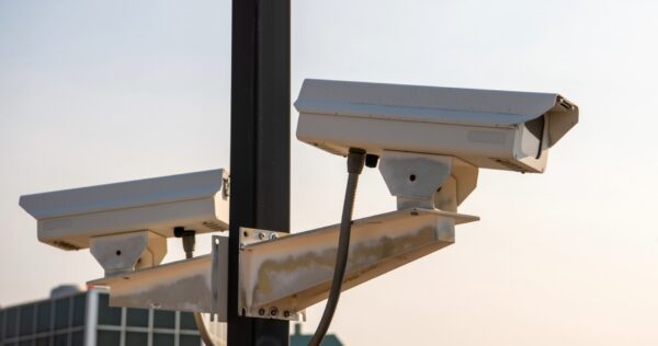 surveillance camera on a poll